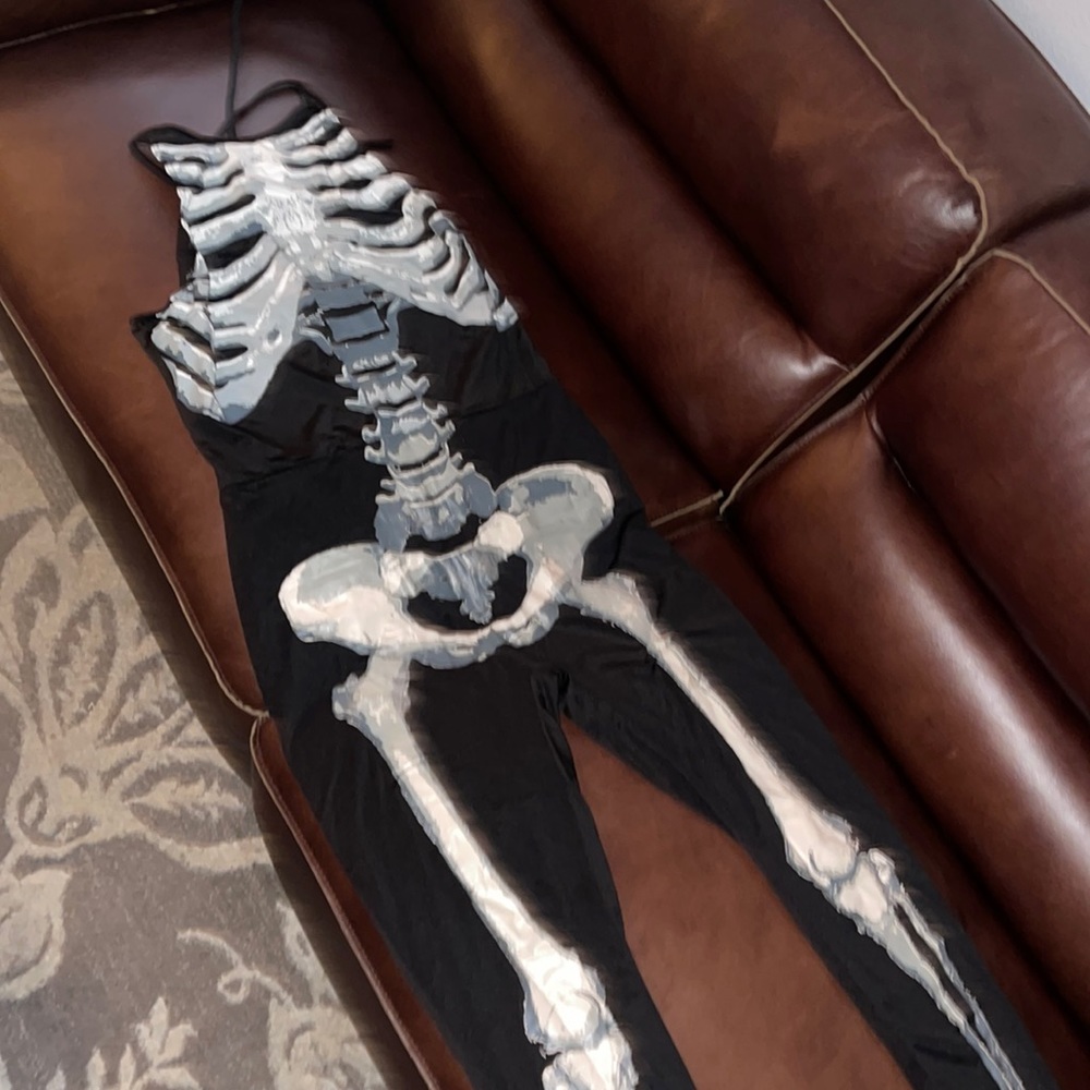 Halter tie tip skeleton one piece jumper